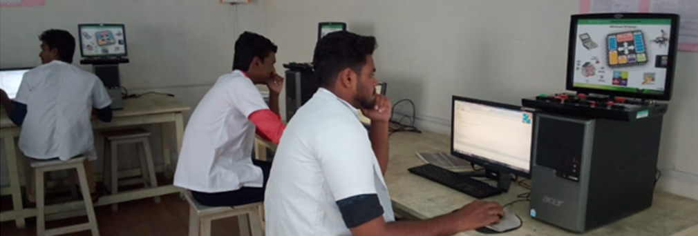 Alpha students using lab equipments in college Embedded laboratory