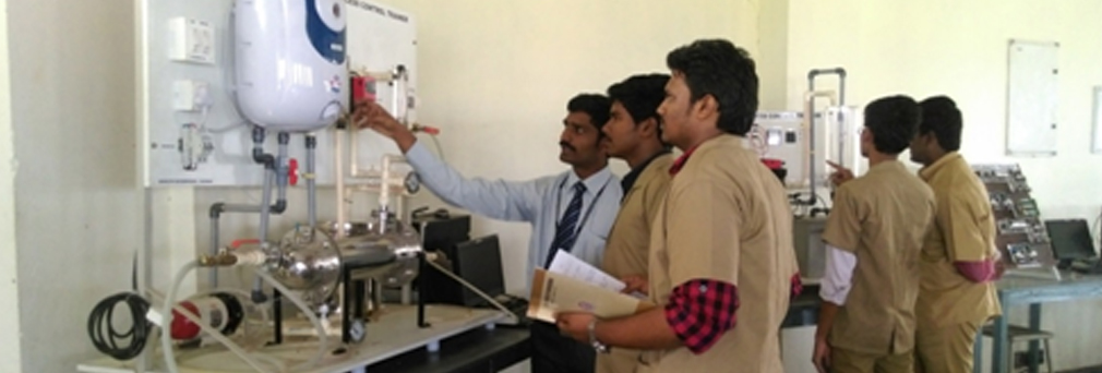 Alpha students using lab equipments in college Mechatronics laboratory