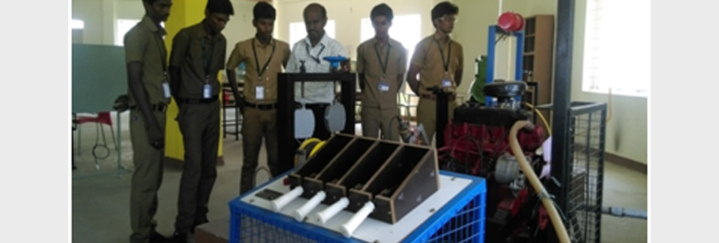 Alpha students using lab equipments in college Thermal Engineering laboratory